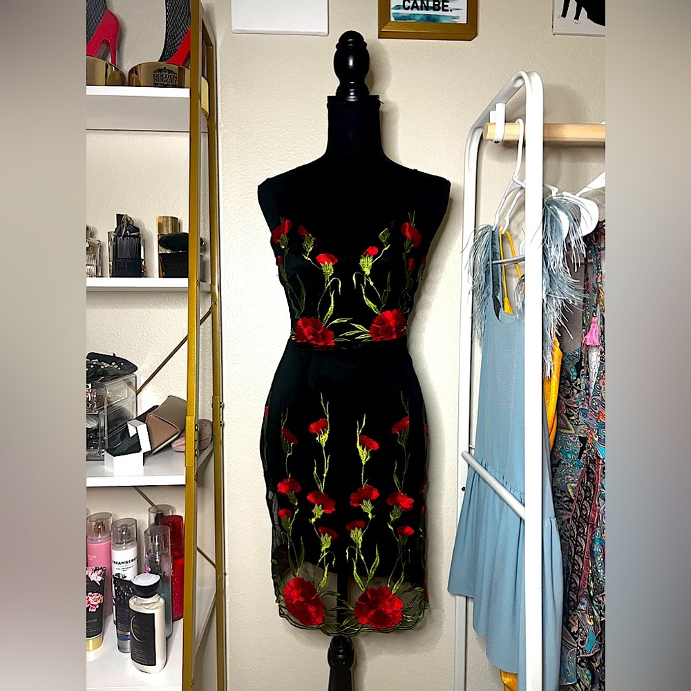 Black dress with red roses.